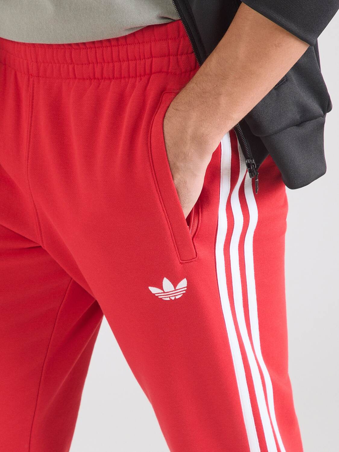Adidas Originals Брюки с зауженным низом в красном цвете — фото 2