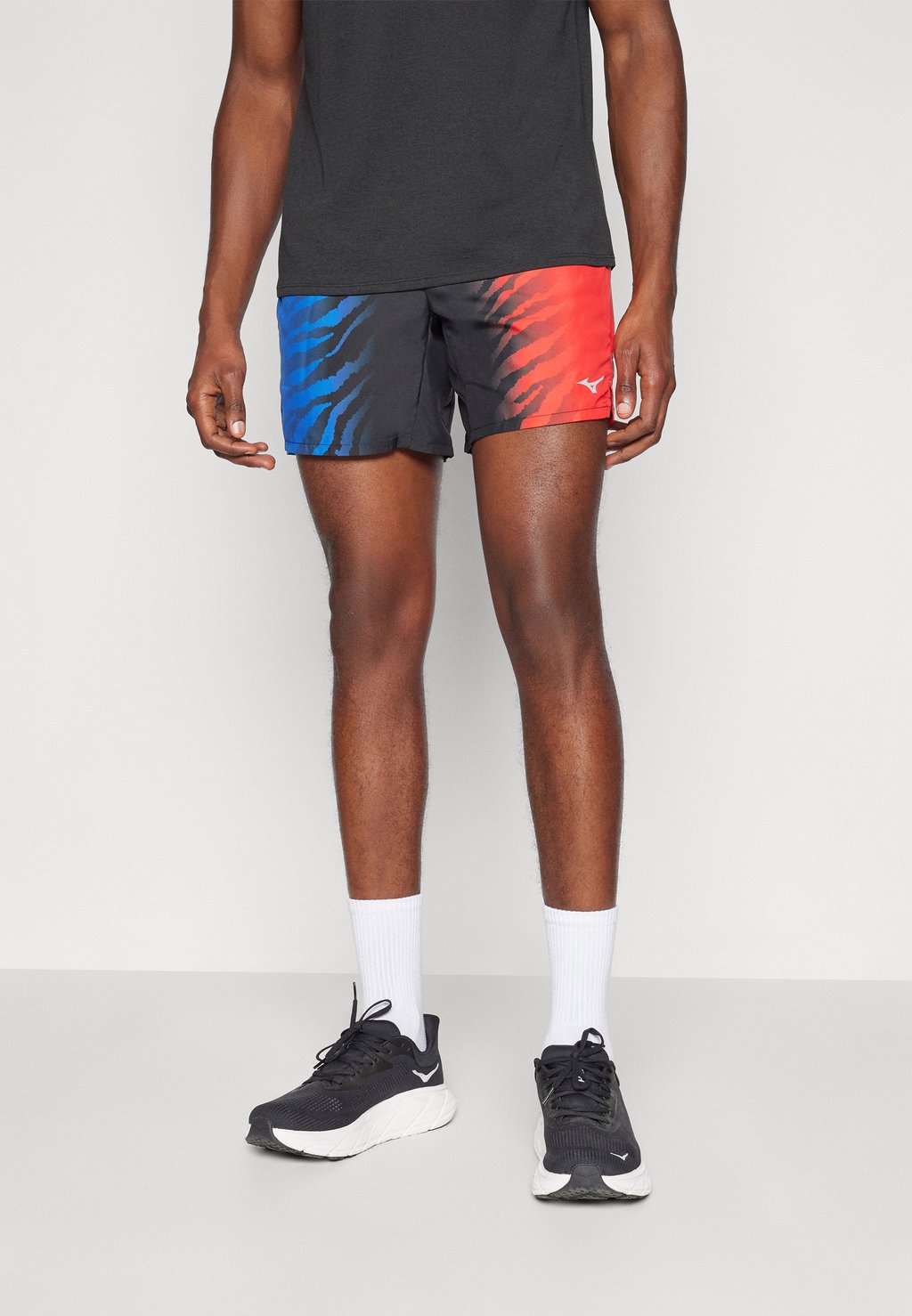 

Спортивные шорты POCKET SHORT Mizuno, светло-красный