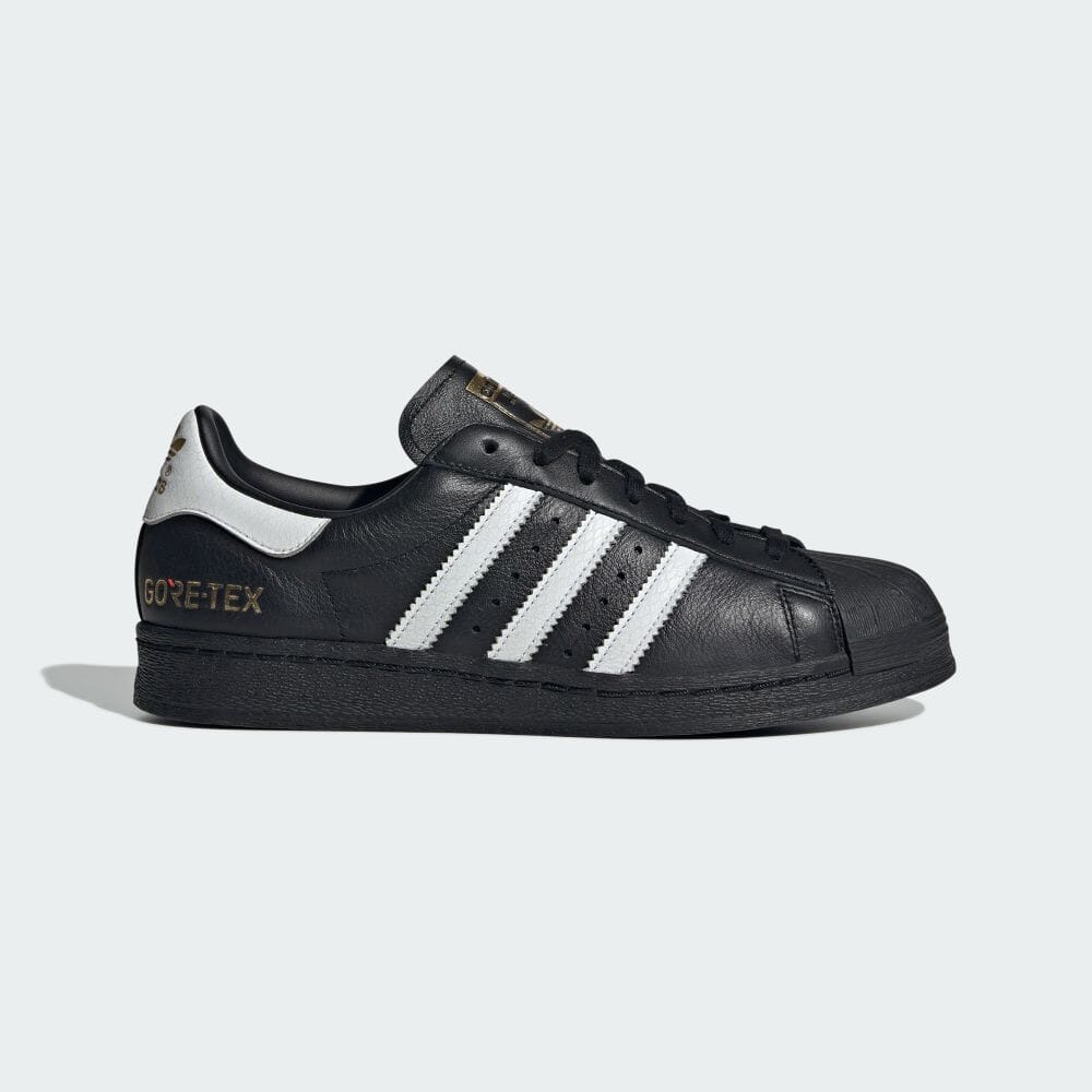 

Кроссовки Adidas SUPERSTAR 82 GTX ATMOS GID-SNK, цвет Black/White/Gold Metallic