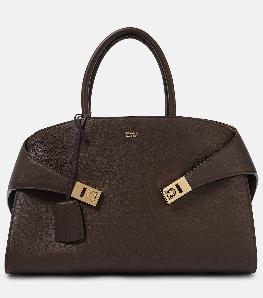 

Кожаная сумка-тоут Hug Medium Ferragamo, Testa Di M || Burnt Ocra