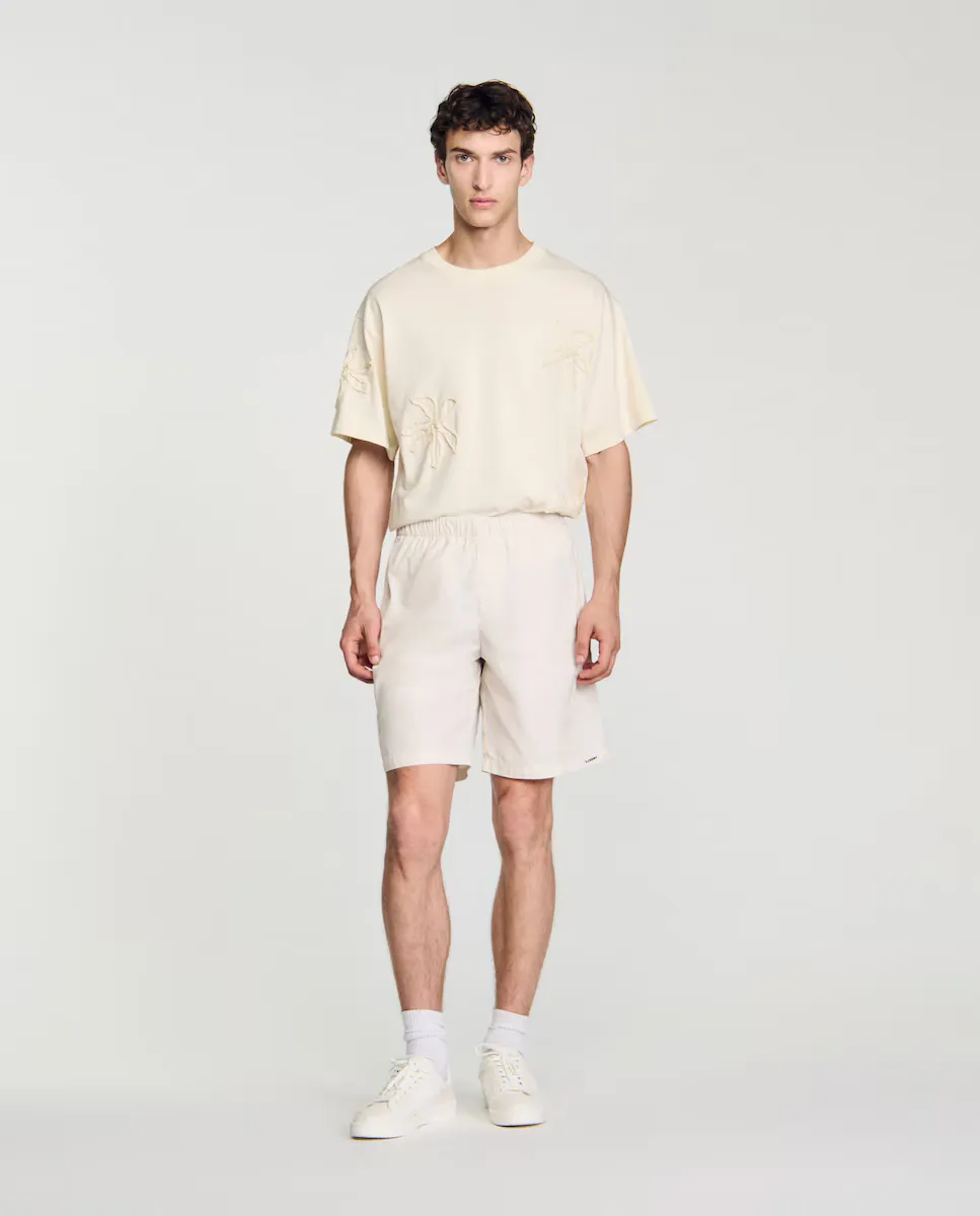 

Мужские шорты-бермуды из технического материала Sandro, белый