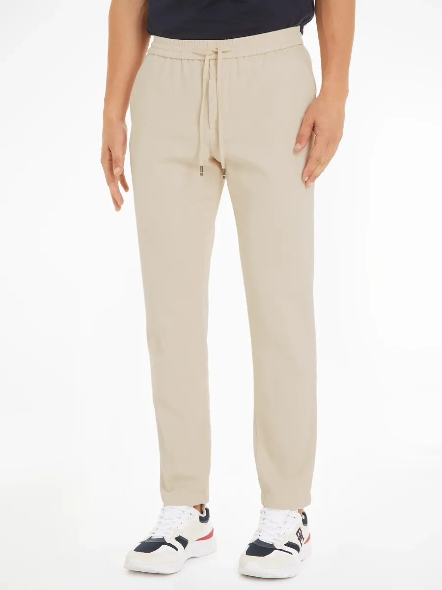 

Брюки-чиносы Tommy Hilfiger "CHINO HARLEM PO DRW STRCTRE GMD", бежевый