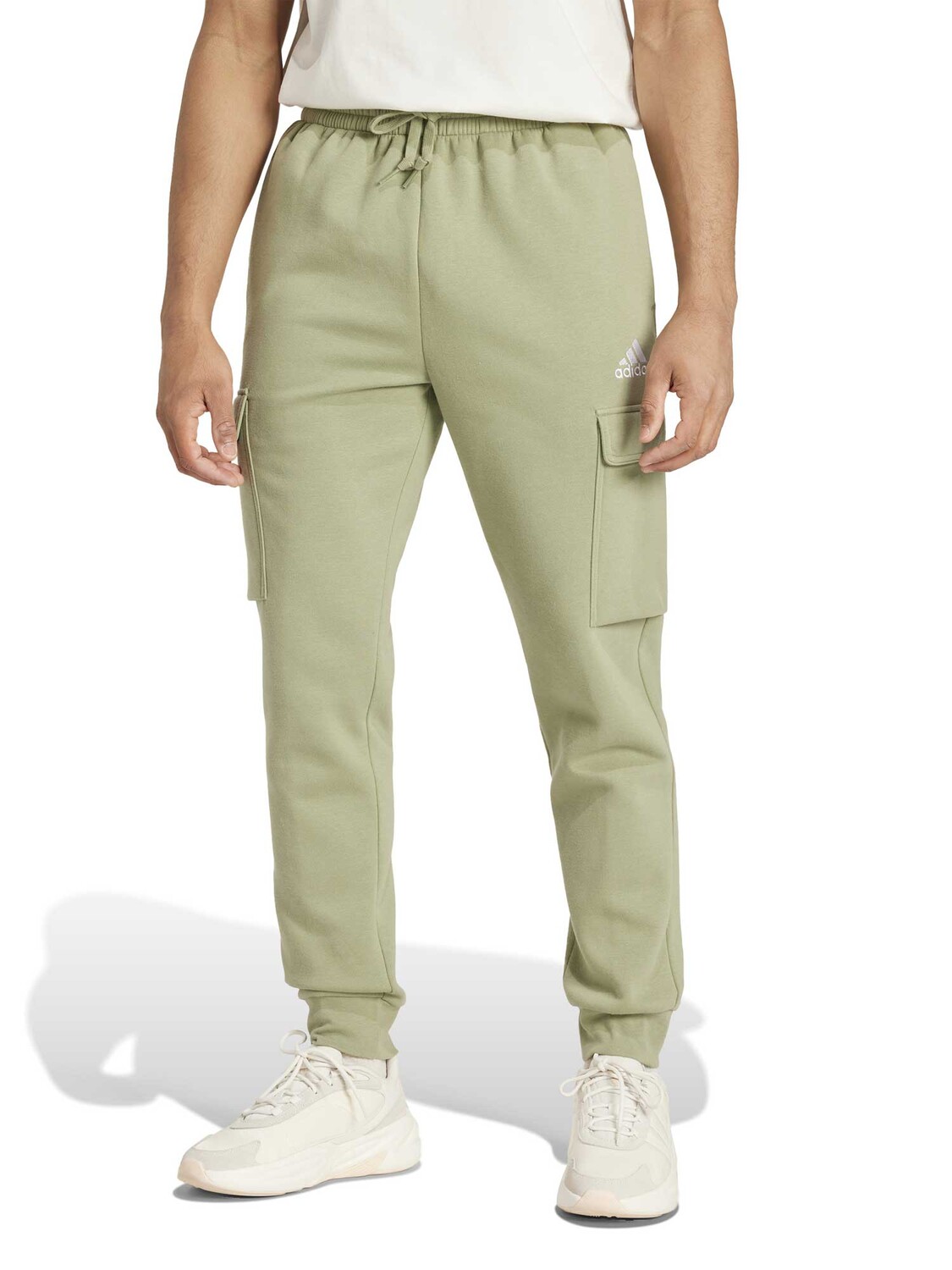 

Спортивные брюки Adidas Sportswear Essentials Fleece Regular, зеленый