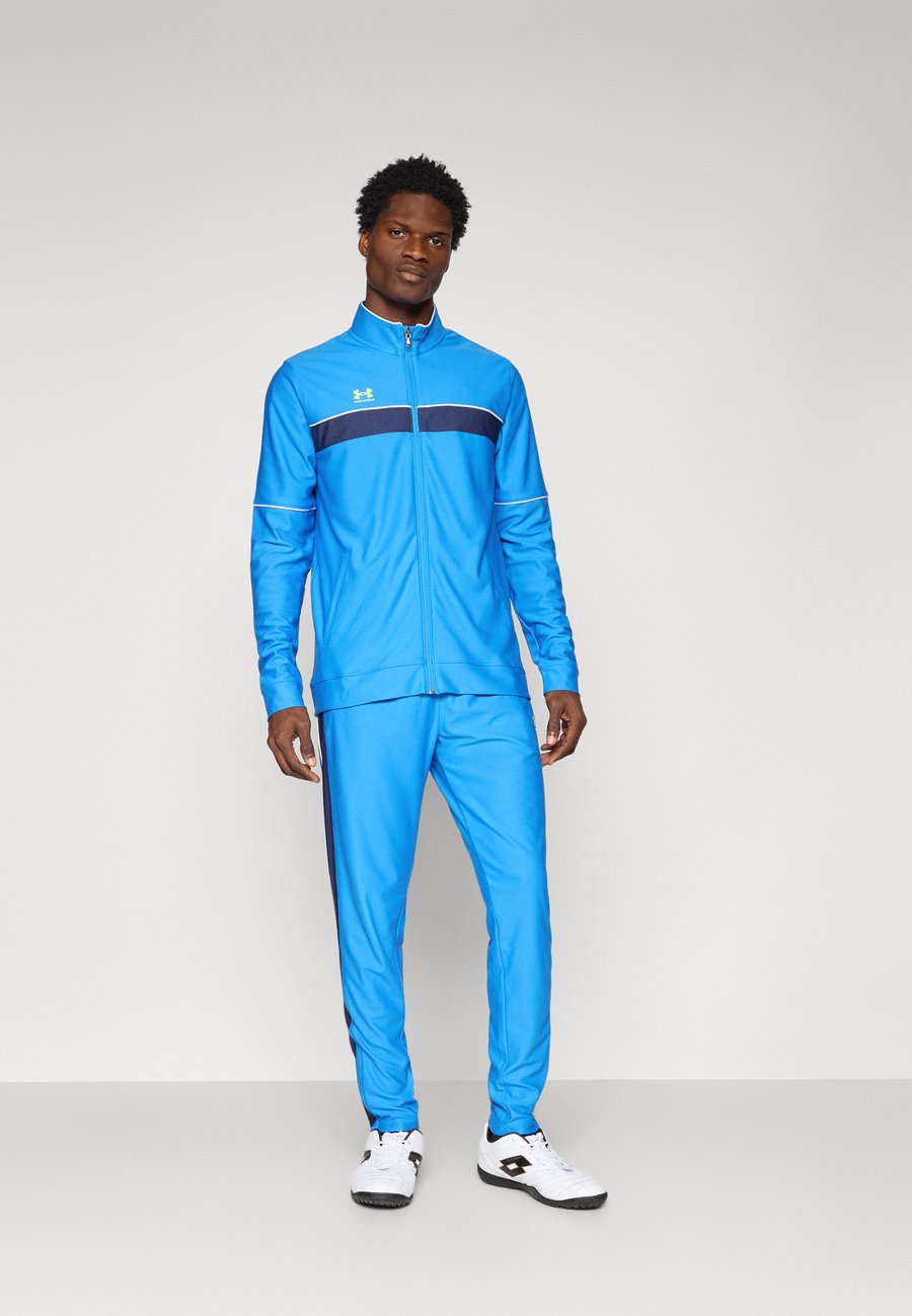 

Спортивный костюм Under Armour CHALLENGER, Blue Atlantis/High Visibility Yellow/Blue