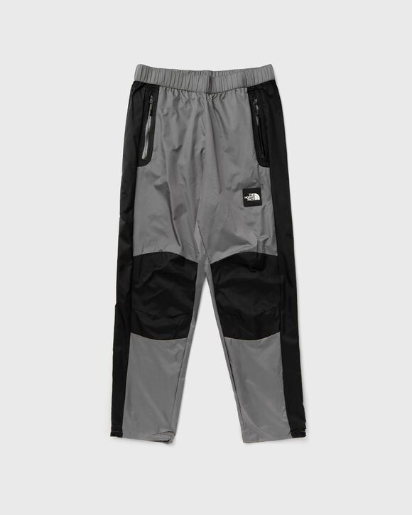 

Брюки The North Face M Wind Shell Pant, цвет smoked pearl/tnf black