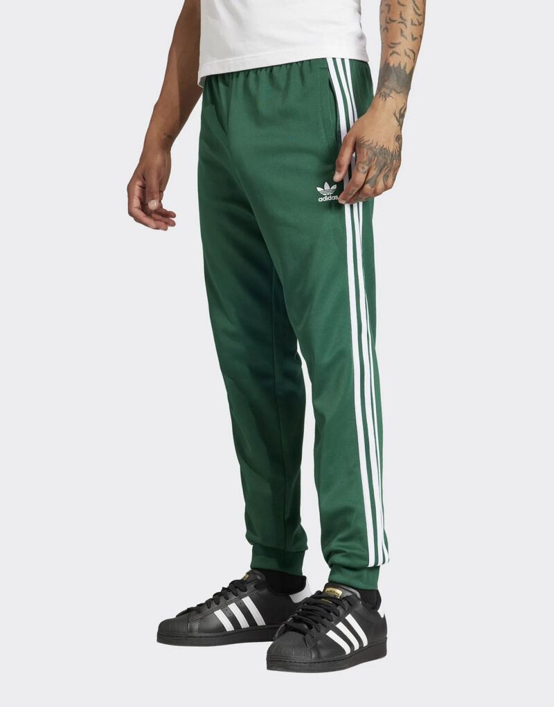 

Зеленые спортивные брюки adidas Superstar