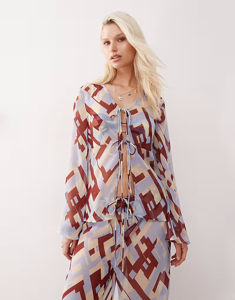 

Прозрачный пляжный топ с завязками спереди и геометрическим принтом Reclaimed Vintage, мультиколор