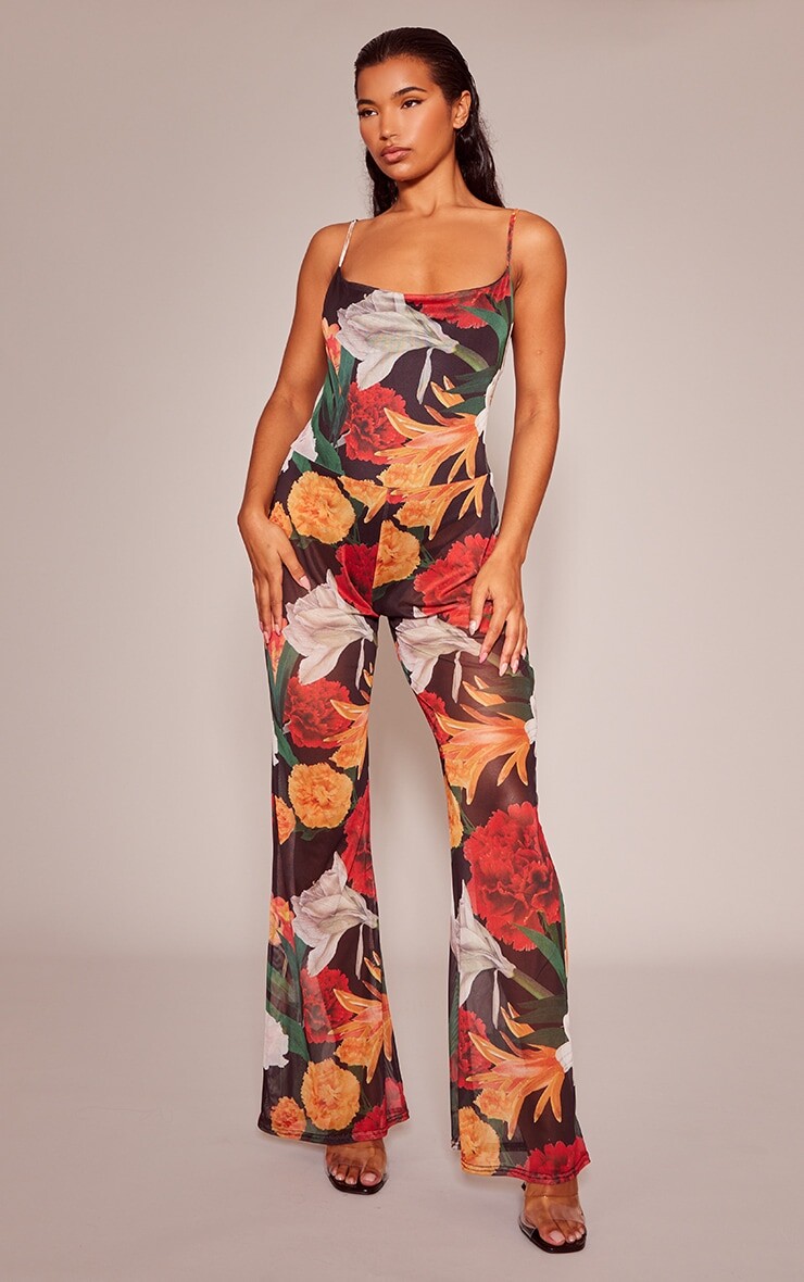 

PrettyLittleThing Сетчатый комбинезон с разноцветным цветочным принтом и воротником-хомутом