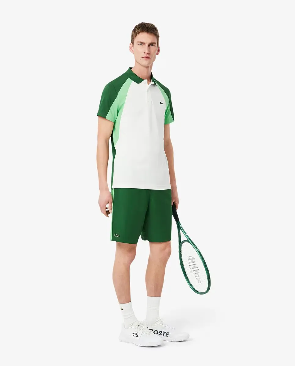 

Мужские спортивные шорты с принтом и фирменной символикой Lacoste, зеленый