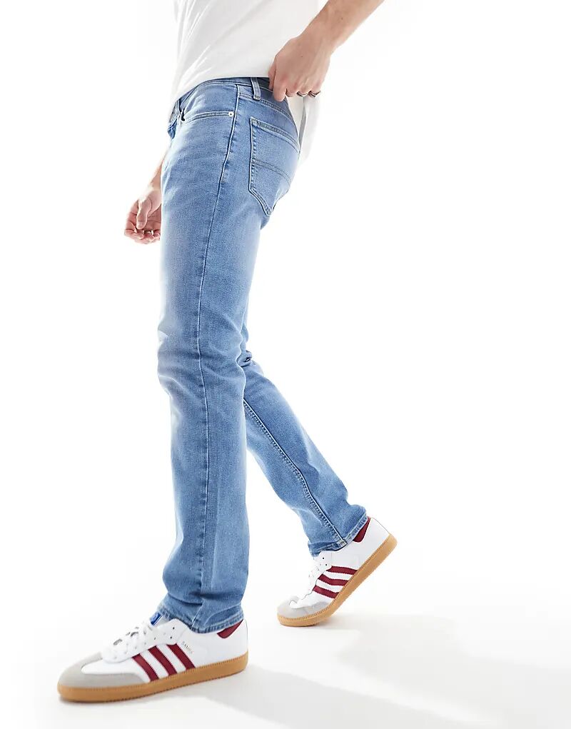 

Выцветшие джинсы синего цвета Tommy Jeans