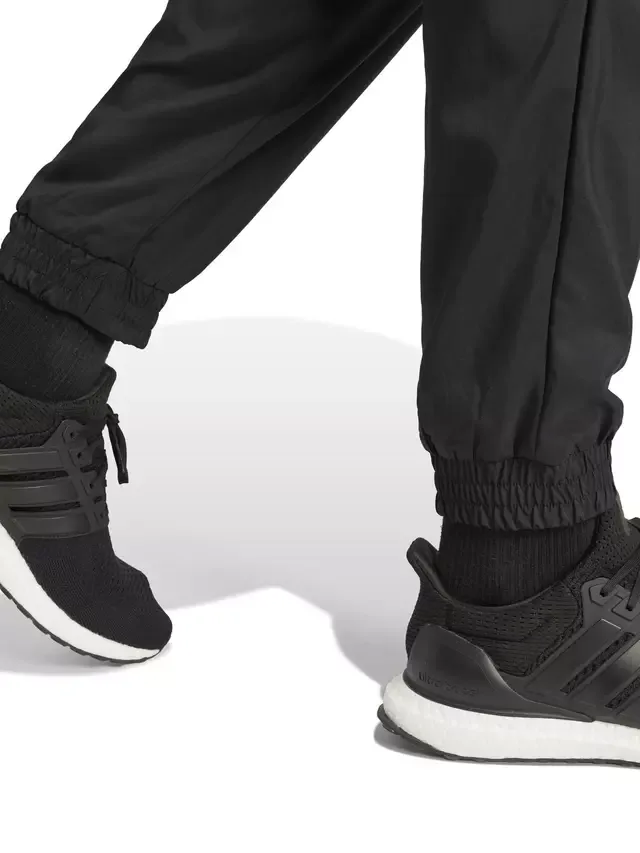 Спортивные брюки Essentials Logo Stanford Training Joggers, черно-белые adidas — фото 4