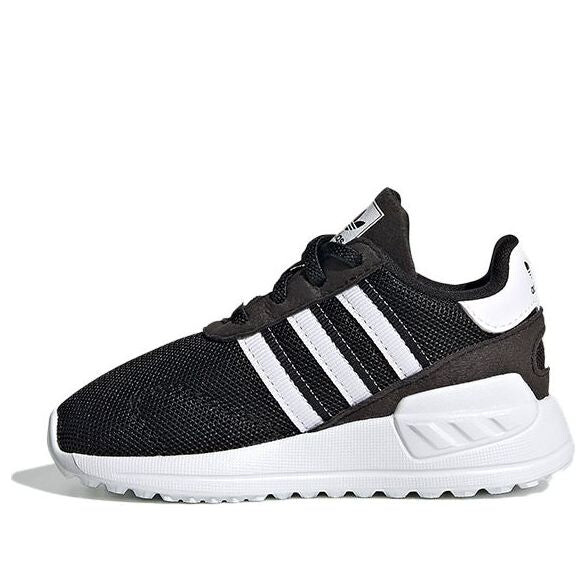 

Кроссовки оригинальные la trainer lite Adidas, черный