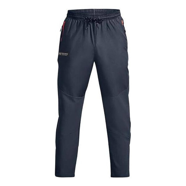 

Брюки rush woven pants 'dark grey' Under Armour, серый