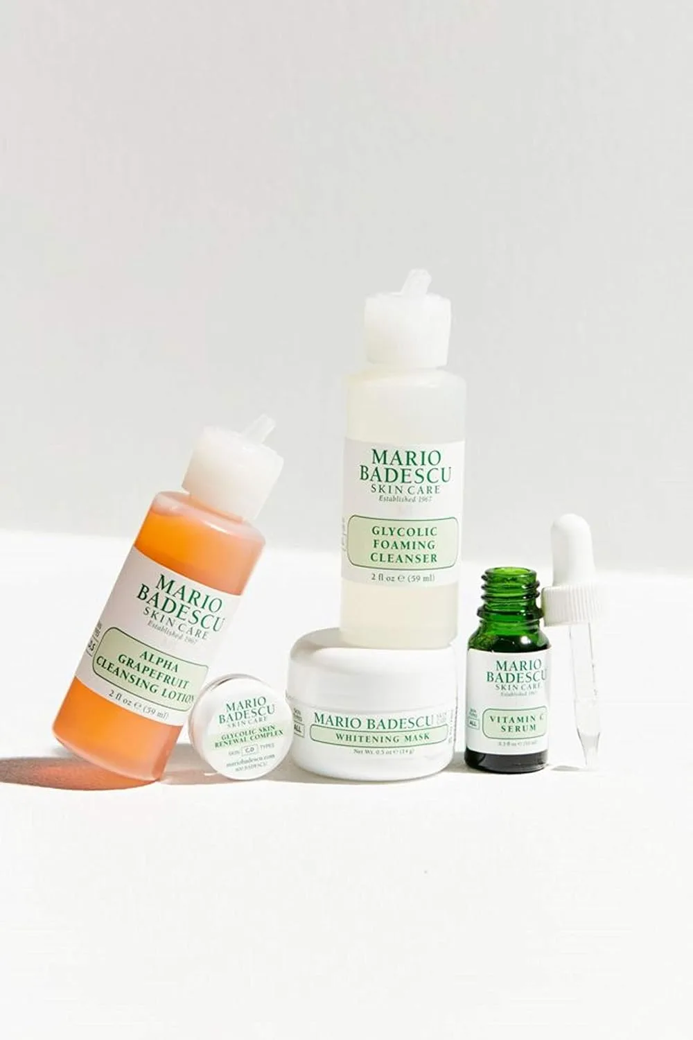 Набор для осветления кожи Mario Badescu, 5 предметов: очищающая пенка с гликолевой кислотой, очищающий лосьон с альфа-глюконатом и грейпфрутом, сыворотка с витамином C, осветляющая маска и комплекс для обновления кожи с гликолевой кислотой Набор... — фото 4