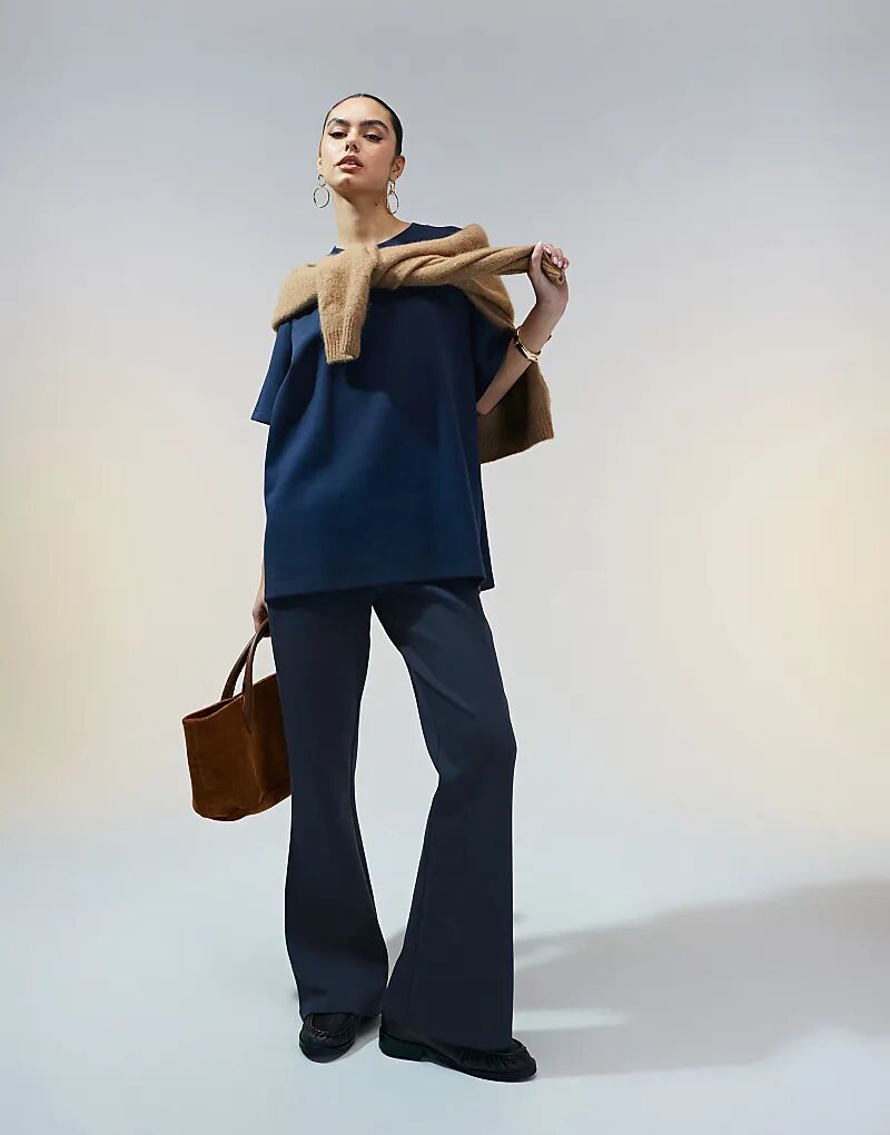 

Расклешенные спортивные брюки-джоггеры ASOS DESIGN из комбинезона темно-синего цвета
