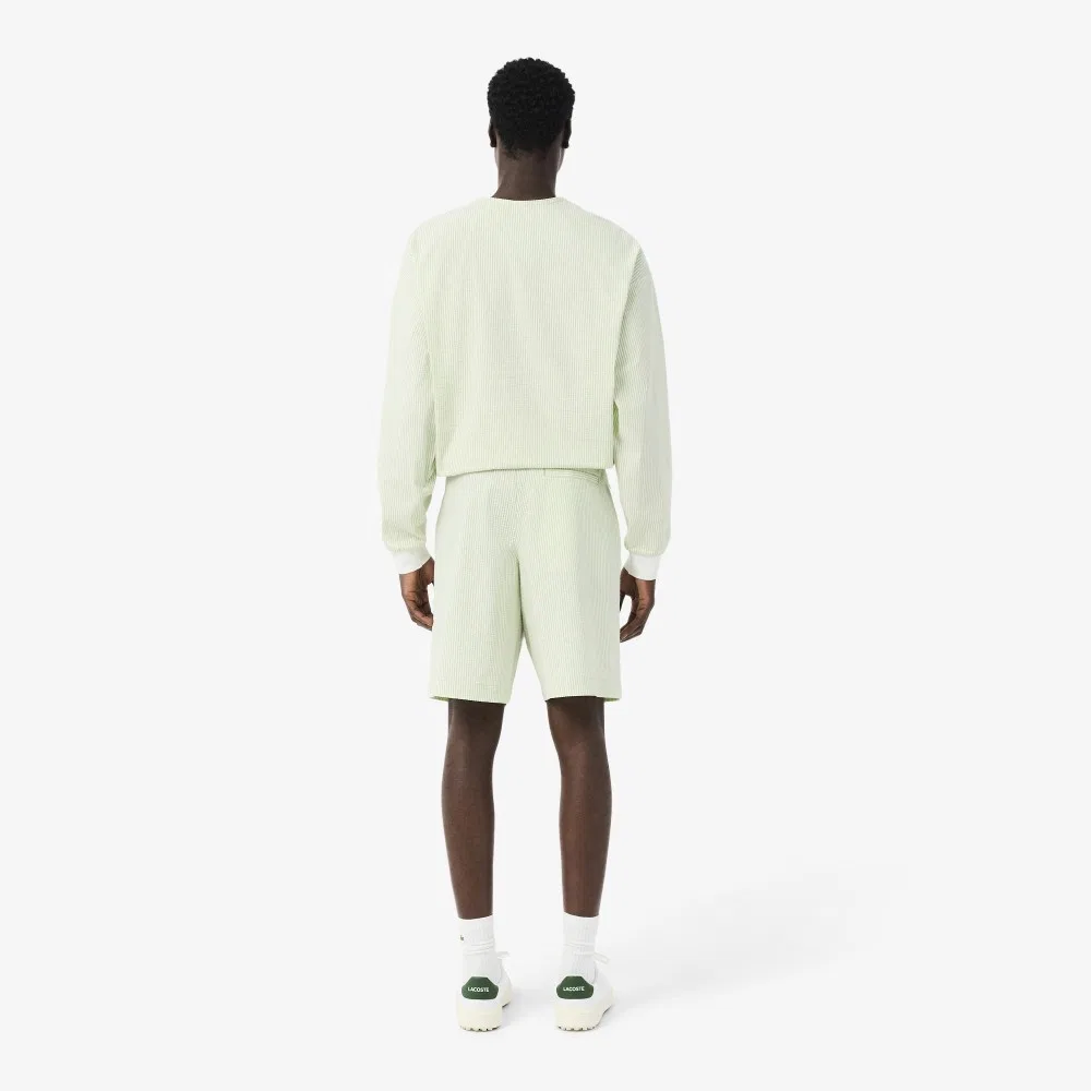 Мужские гольф-шорты из сирсакера жёлто-зелёные от Lacoste — фото 3