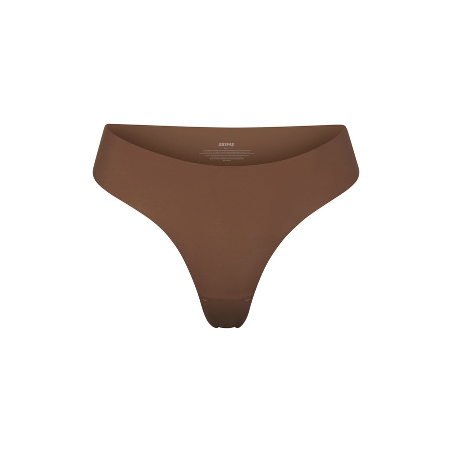 

Стринги с окучиванием SKIMS Naked, цвет Jasper