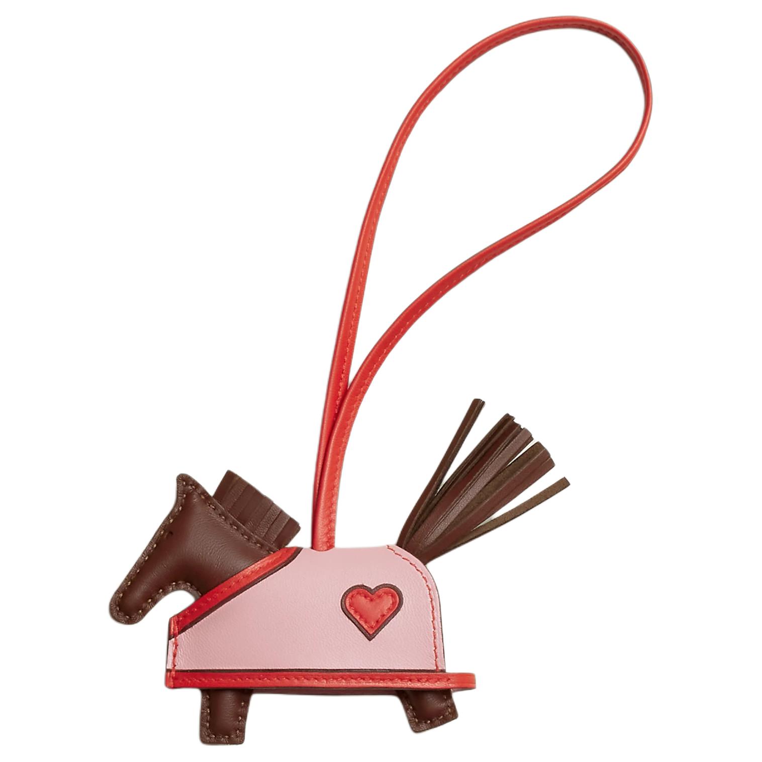 

HERMES Аксессуар Rodeo Milo Lambskin Bag Small для женщин в цветах Earth Tone и Cappuccino Red