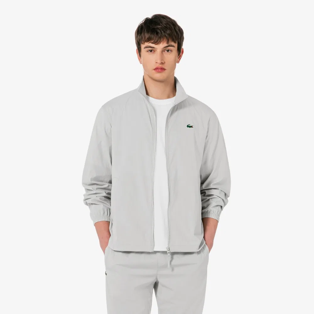 Мужской пиджак из эластичной ткани серого цвета от Lacoste