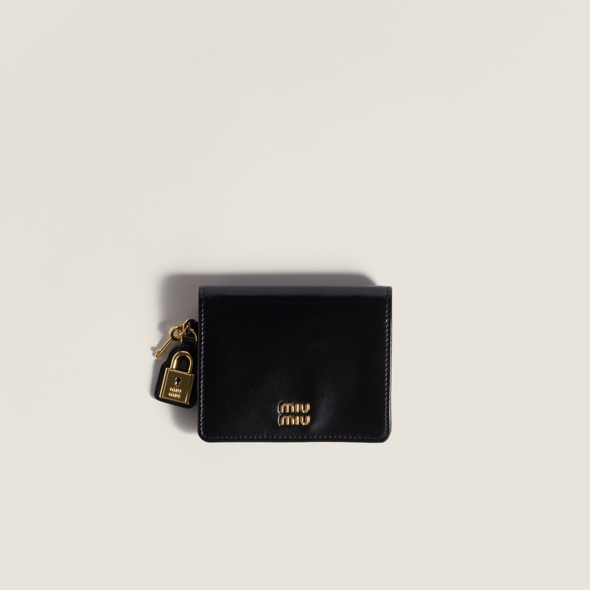 

Маленький кожаный кошелек MIU MIU, черный