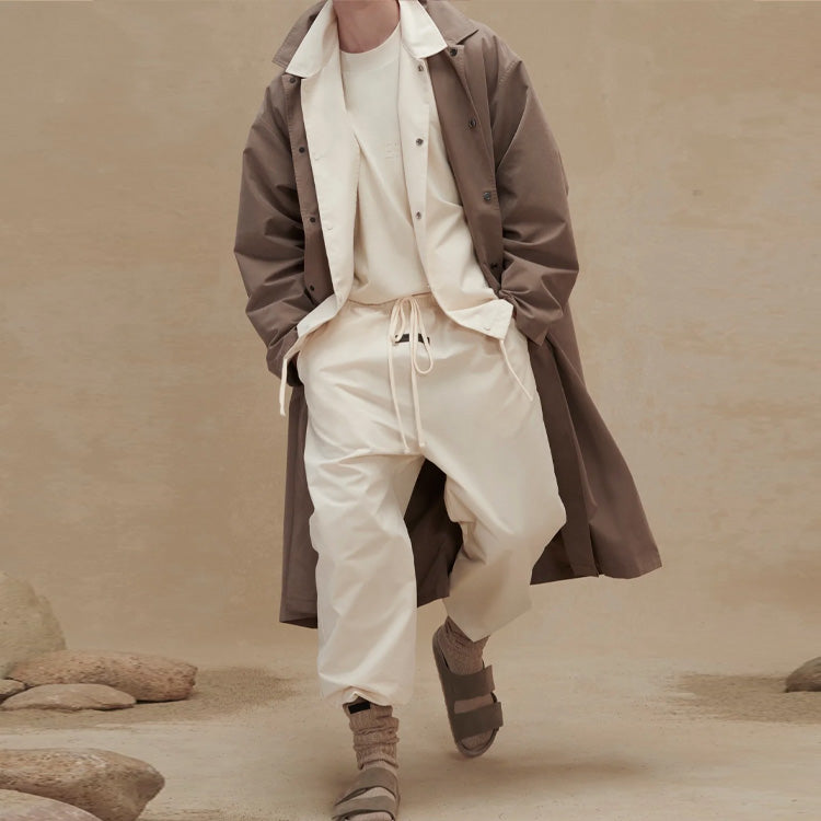Повседневные брюки Fear of God Essentials FW22 Relaxed Trouse Egg shell, белый — фото 4