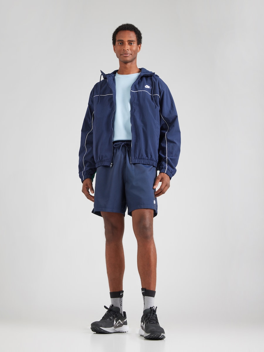 

Свободные спортивные брюки Nike Sportswear CLUB, темно-синий