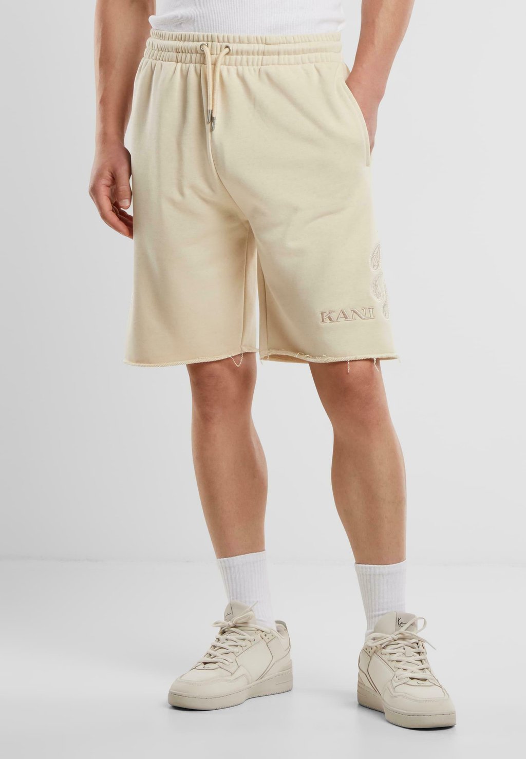 

Шорты RETRO - Tracksuit bottoms Karl Kani, бежевый