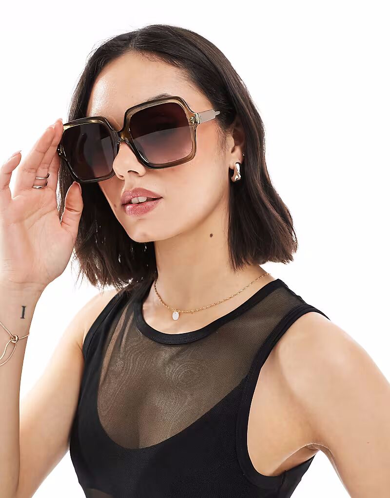

Солнцезащитные очки ASOS DESIGN 70-х годов в кристально-зеленом цвете