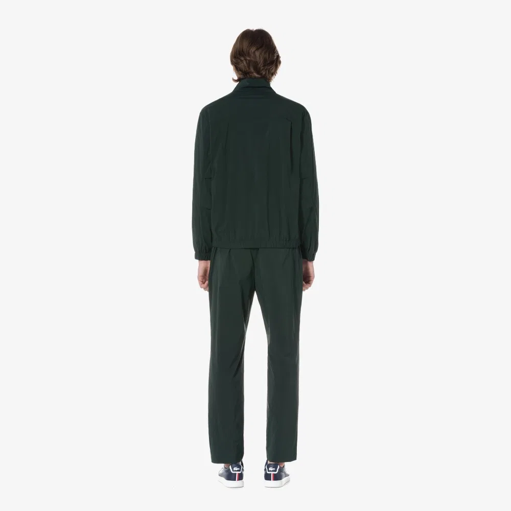 Мужские тканые базовые брюки глубокого зелёного цвета от Lacoste — фото 2