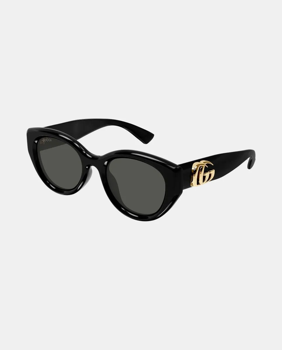 

Женские овальные солнцезащитные очки из пластика Gucci, черный