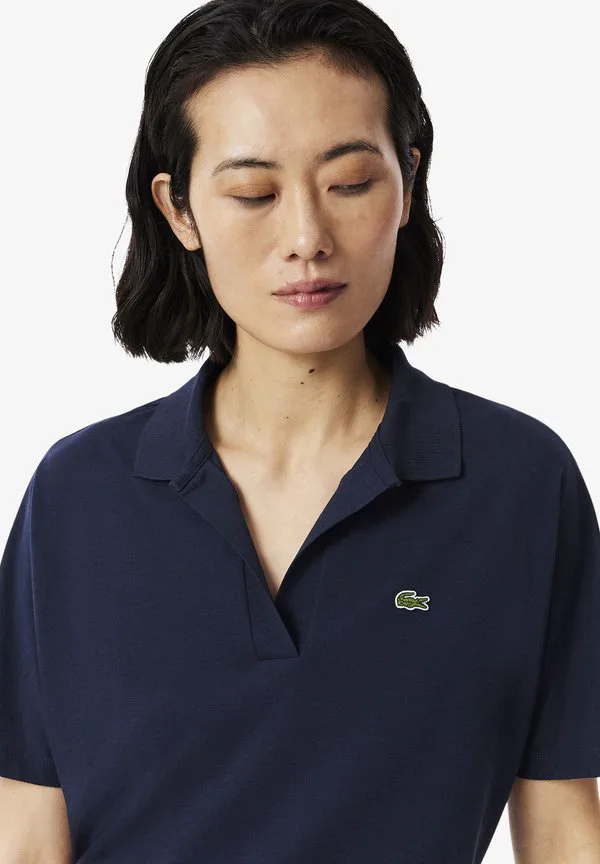Рубашка-поло Lacoste Bleu Nuit, однотонная, дышащая — фото 4