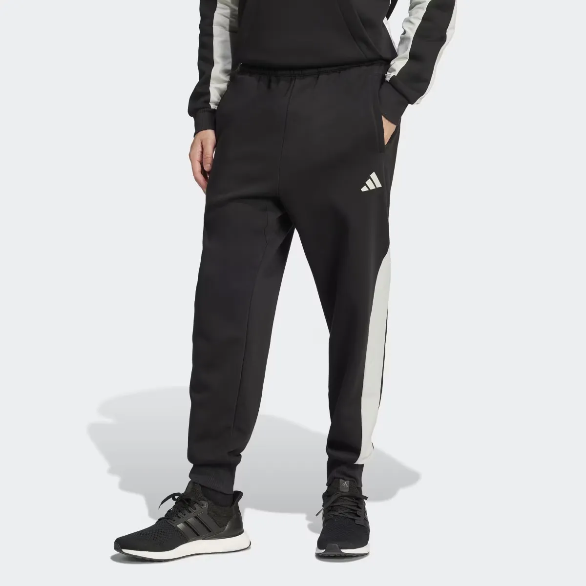 

Мужские Сезонные Essentials Колорблок Брюки Adidas, чёрный