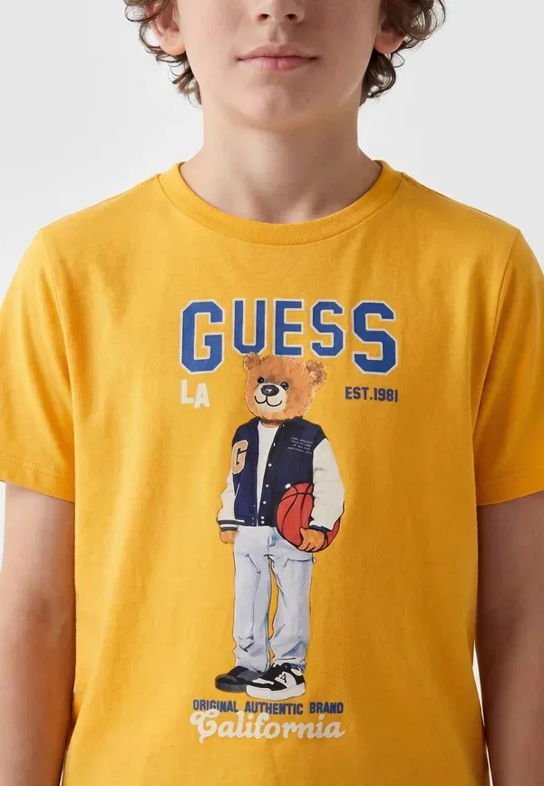 Футболка детская Guess, модель ss t-shirt print t-shirt, желтый — фото 3