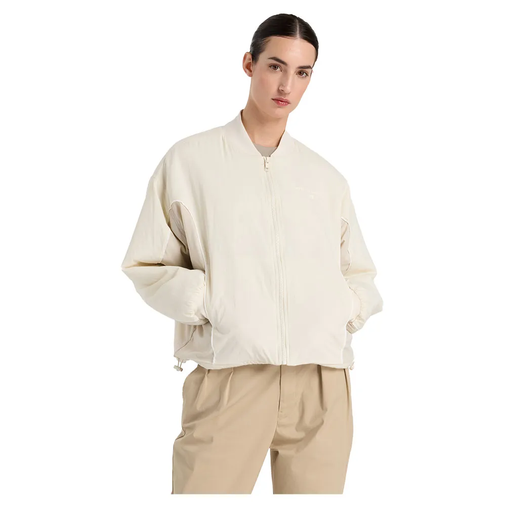 

Куртка New Balance Reimagined bomber, бежевый