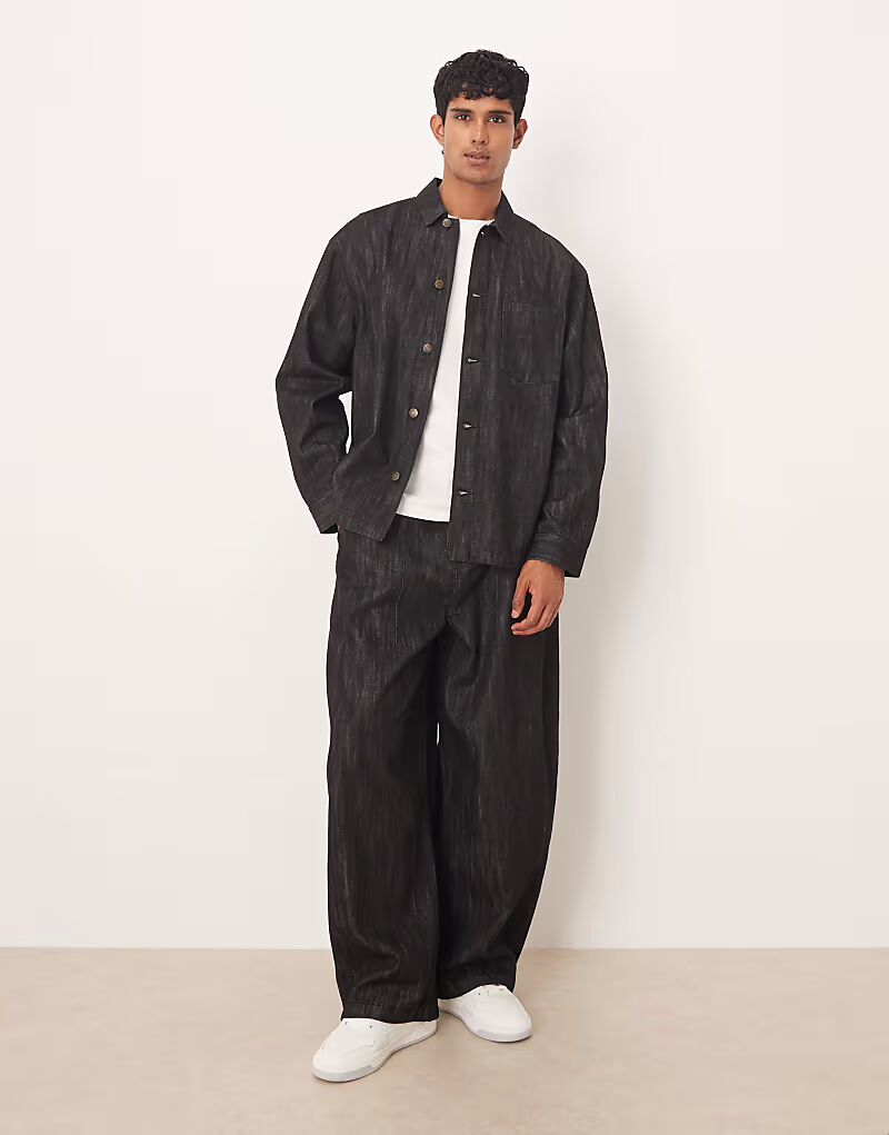 

Джинсы свободного кроя свободного кроя черного цвета с эффектом потертости Asos Design