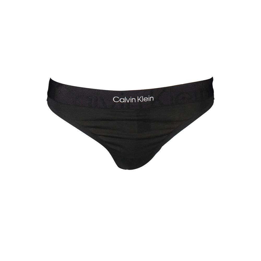 

Черные хлопковые женские стринги Calvin Klein
