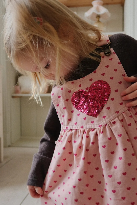 

Детское хлопковое платье NOLA SEQUIN SPENCER DRESS GOTS Konges Sløjd, розовый