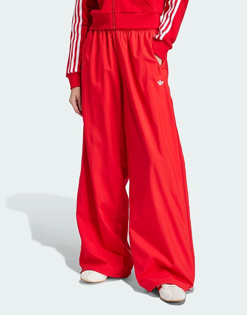 

adidas Originals WOVEN TP Брюки красного цвета