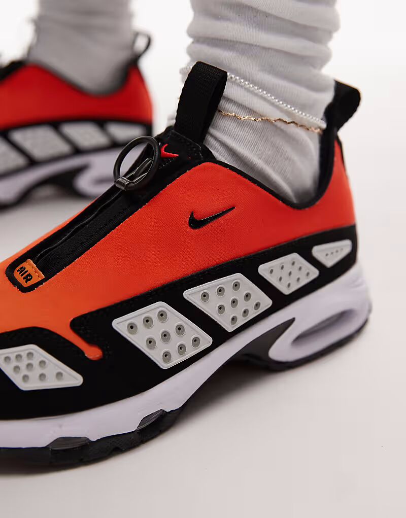 Кроссовки унисекс Nike Air Max SNDR оранжевого и черного цветов — фото 4