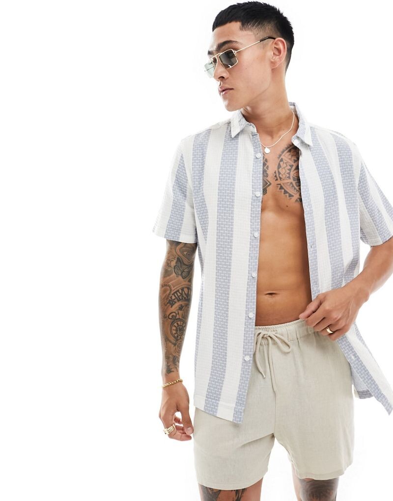 

Синяя рубашка в вафельную полоску ASOS DESIGN
