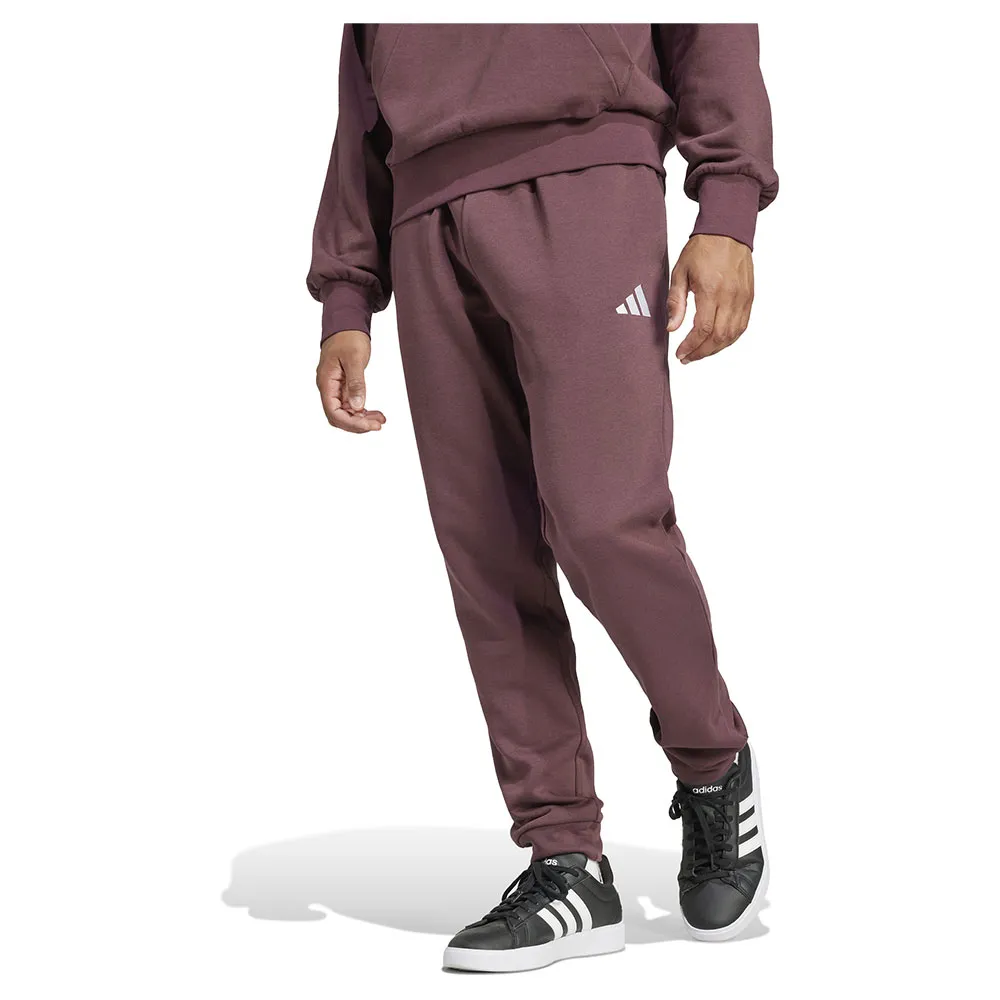 

Джоггеры adidas Essentials Feelcozy Fleece, фиолетовый