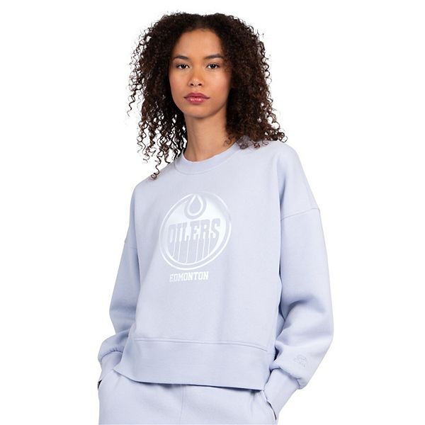 

Женский синий свитшот Edmonton Oilers укороченный oversize Starter