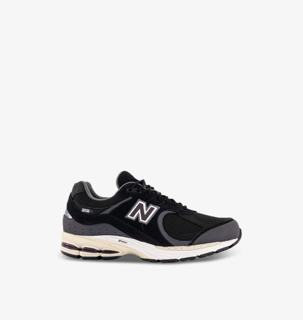 

Низкие кроссовки из замши и сетки 2002 года New Balance, синий