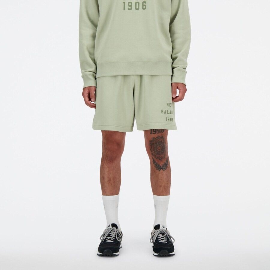 

Брюки new balance Loose fit Pants Iconic Collegiate, зеленый/пастельно-зеленый