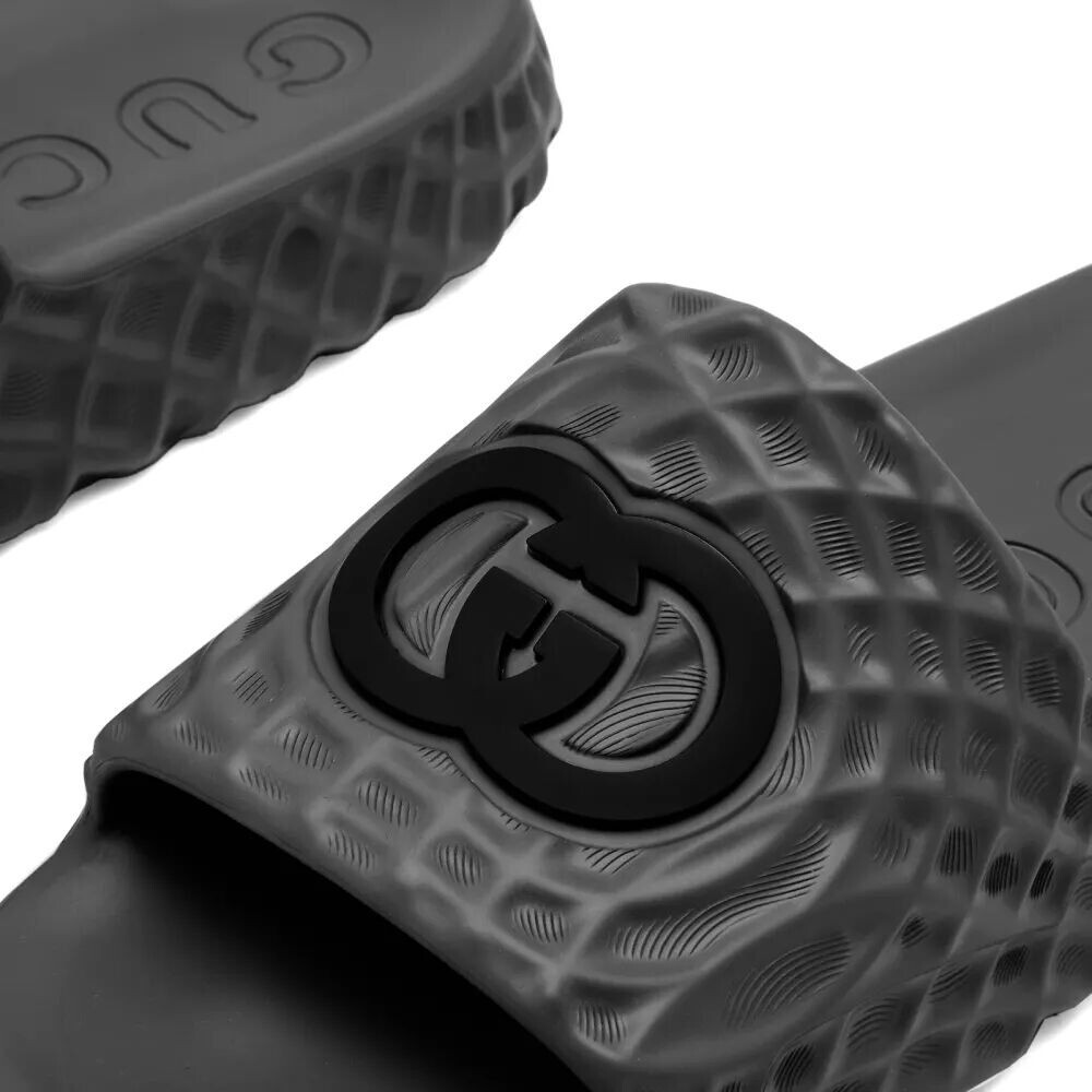 

Gucci Шлепанцы с волнистой подошвой и логотипом, черный