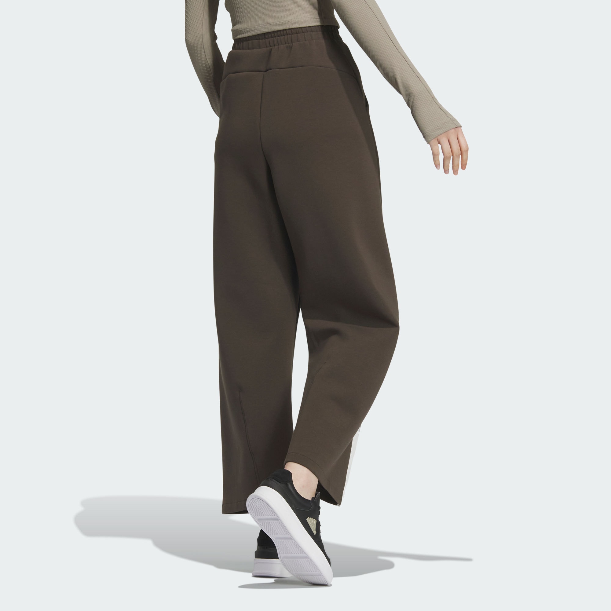 Женские повседневные брюки FW24 темно-оливкового цвета Adidas — фото 4