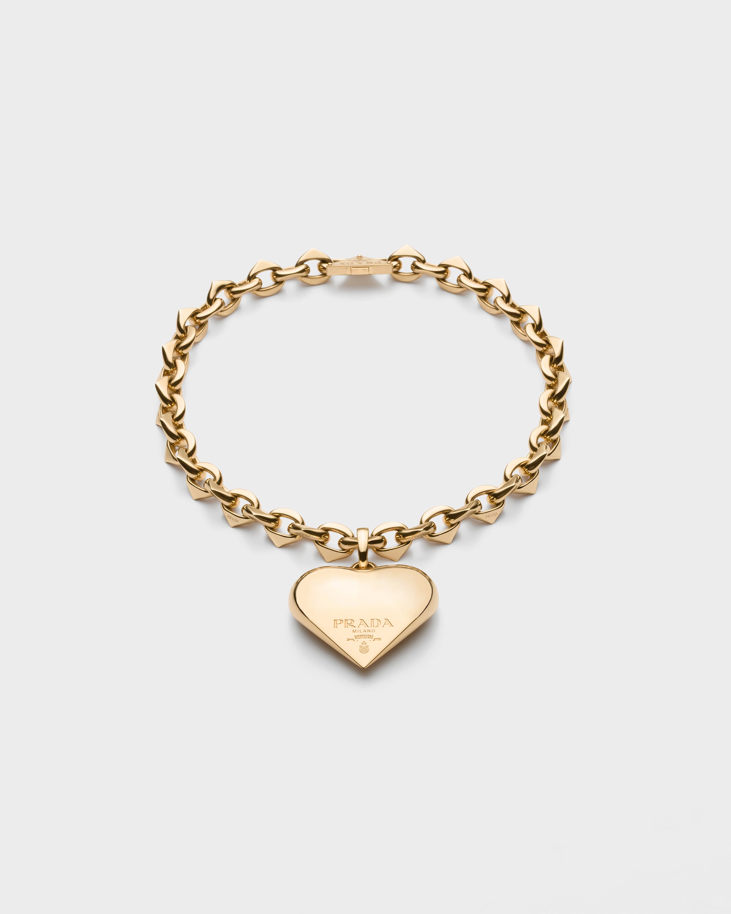 

Колье с крупным кулоном Eternal Gold из желтого золота Prada, золото