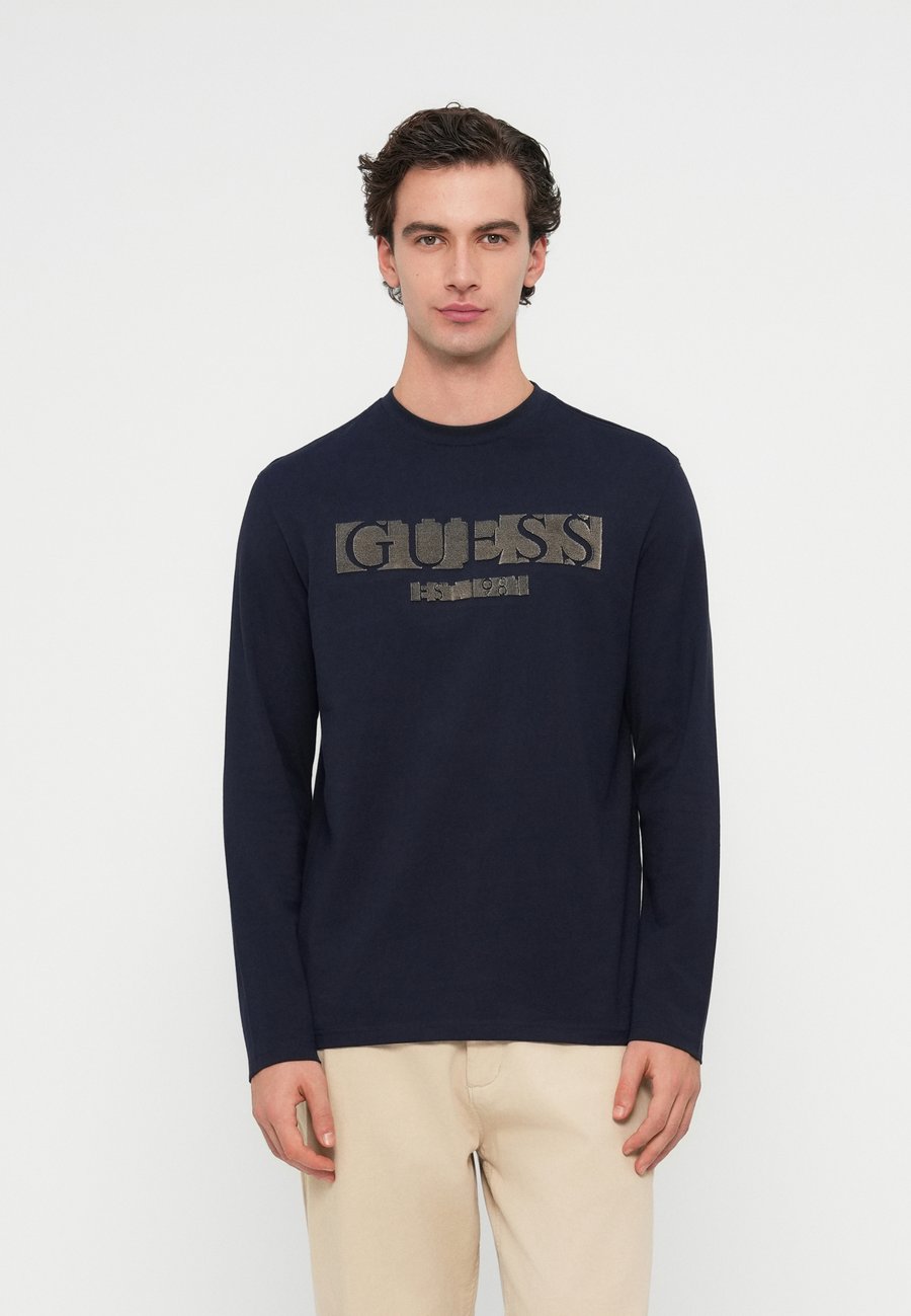 

Топ Guess LOGO FLOCK TEE, Smart Blue/Dark Blue