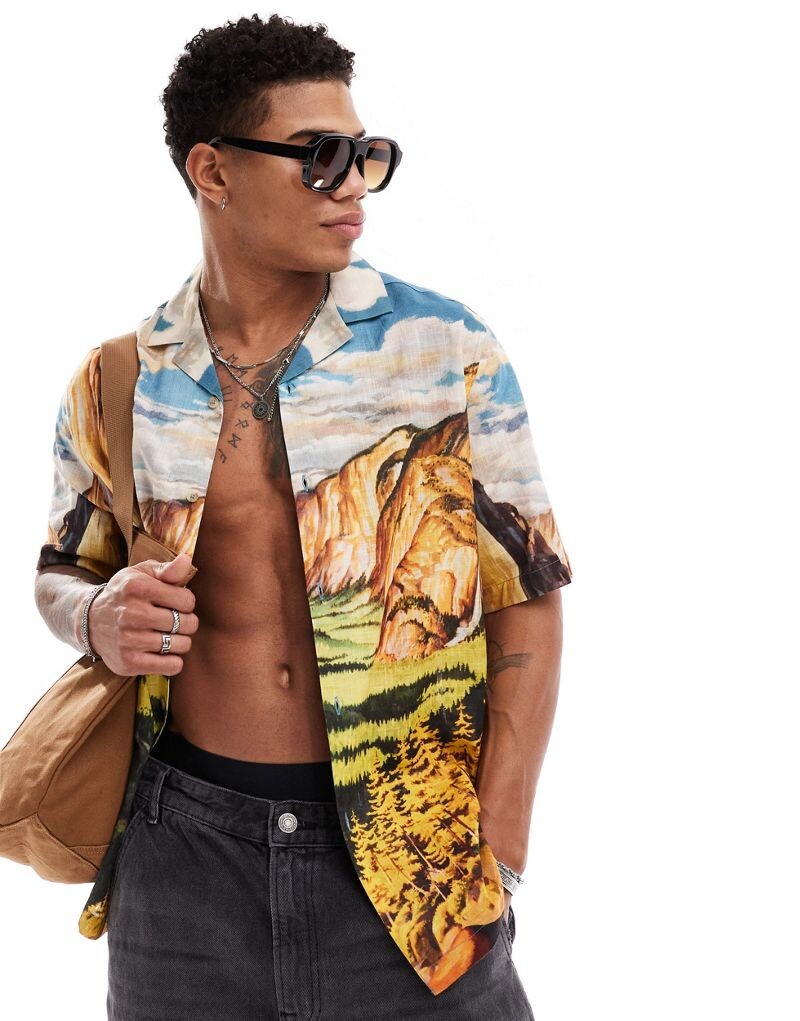 

Свободная рубашка с пейзажным принтом ASOS DESIGN Revere