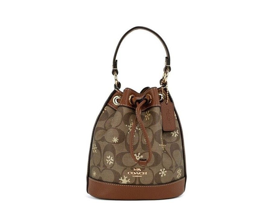 

Сумка-ведро Dempsey 15 Small Snowflake Print из холщовой ткани цвета хаки с покрытием Coach